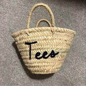 Poolside x Byrdie Social Basket bag “tees” in navy blue